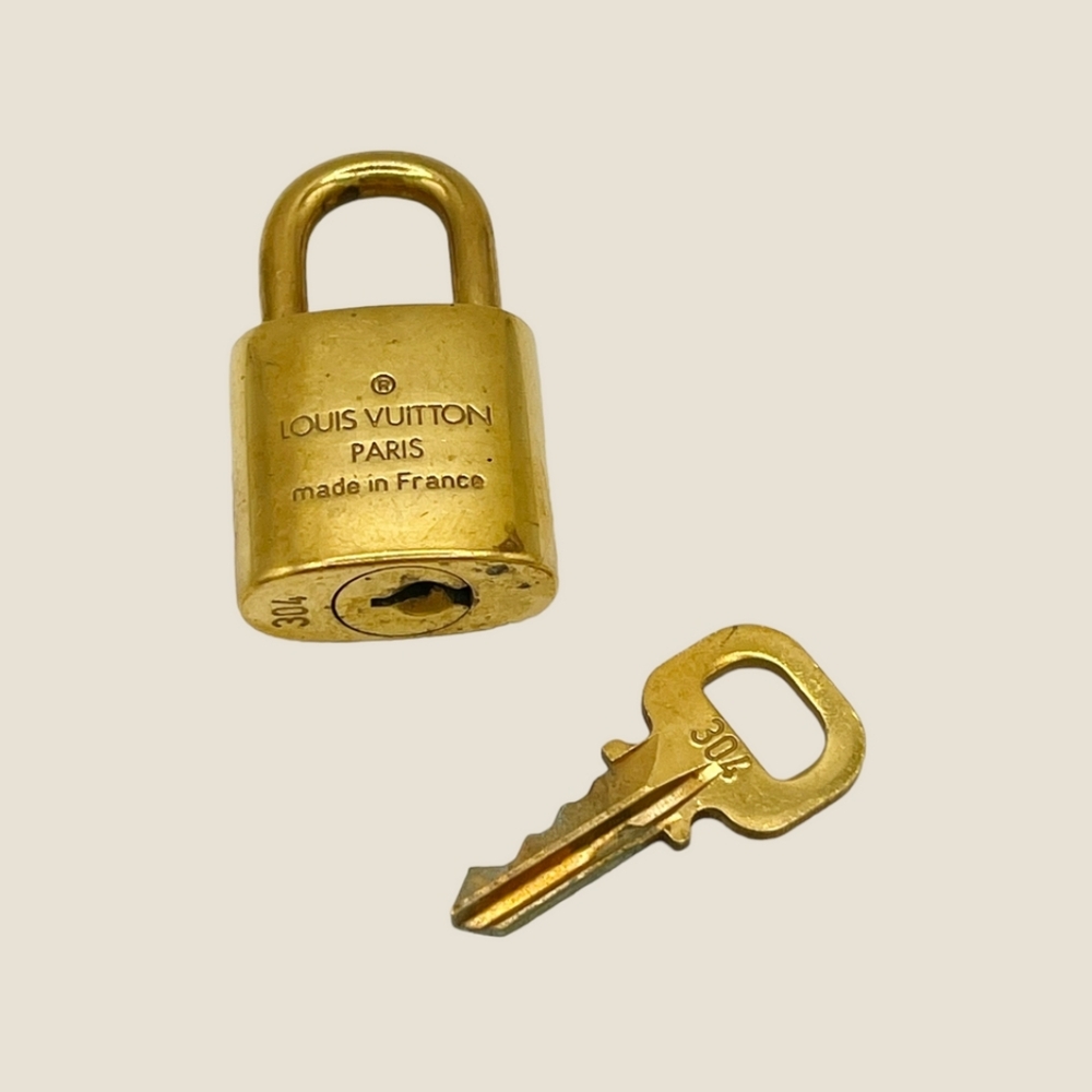 Louis Vuitton Gold Padlock and Key Set No. 304 Perfect Condition Noramal Wear